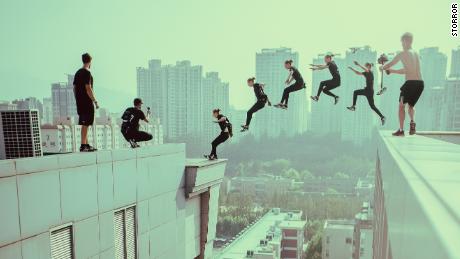 Members of Storror participate in a high-rise jump. 